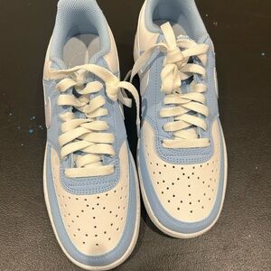 Woman’s NIKe Blue and White Sneakers